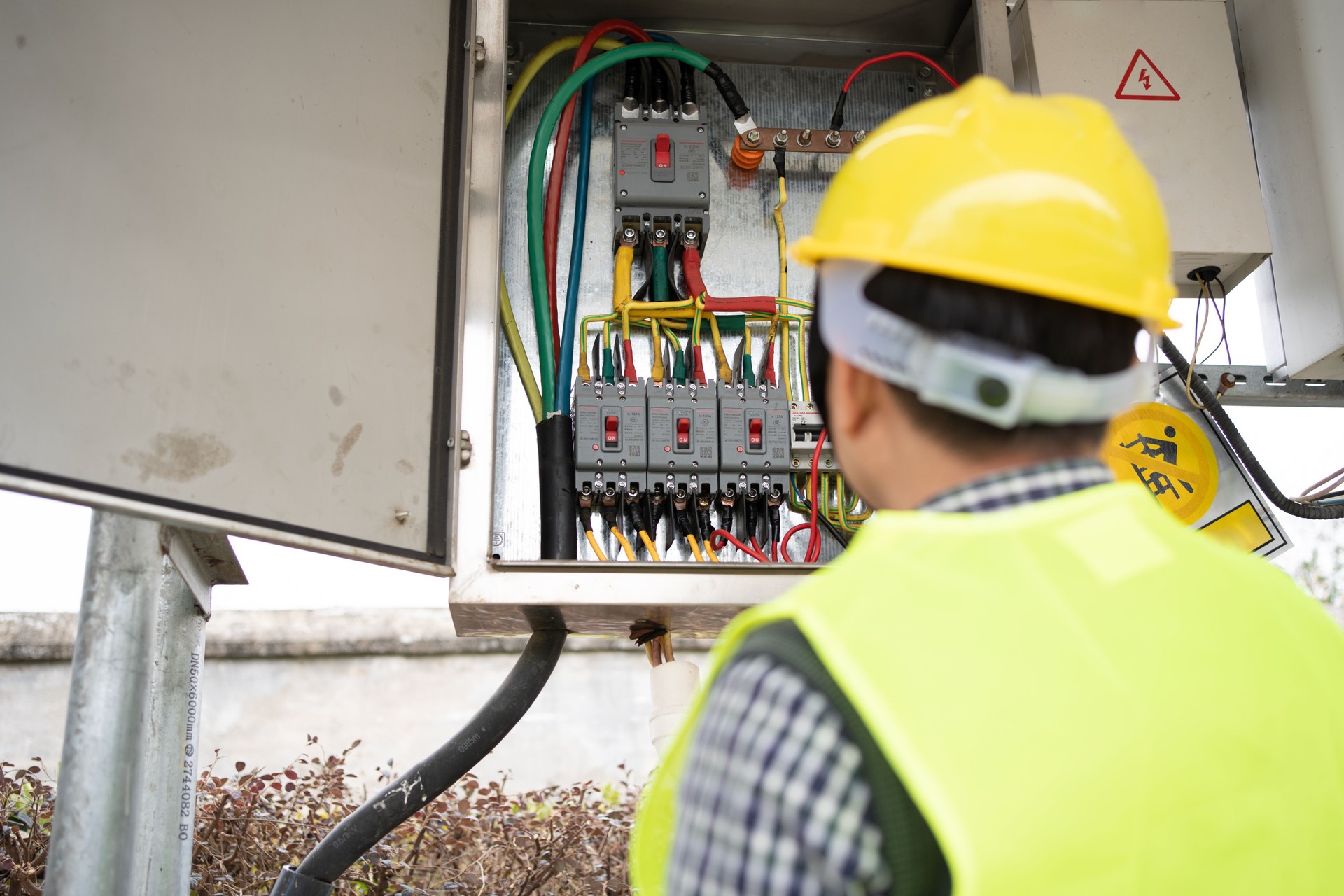 Engineer checking electrical box